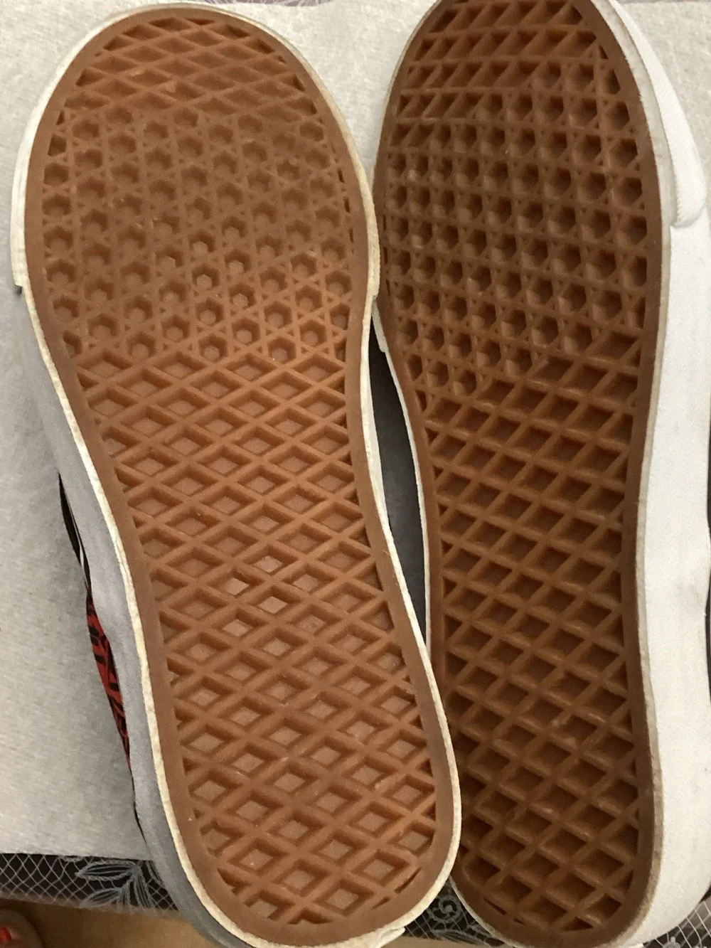 Vans Black Slip-On Loafers with Red and Orange Patterned Collar